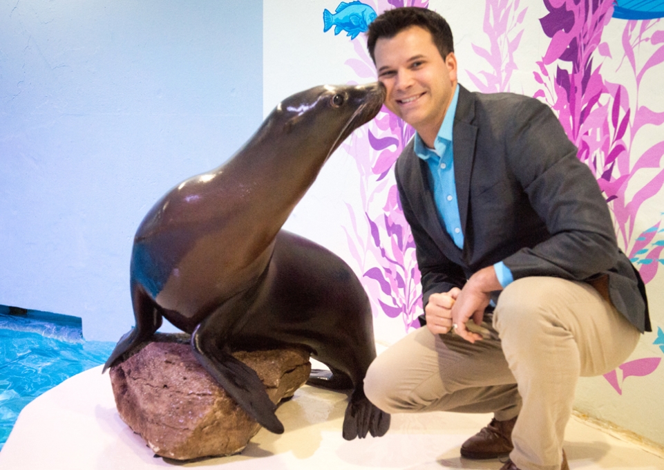 Gary Siddall gets a kiss from a sea lion
